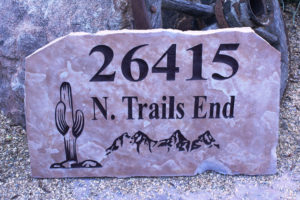 flagstone sign with street address