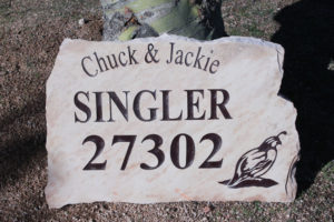 flagstone sign with address